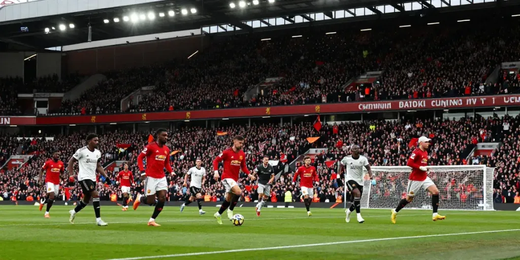 Intense Manchester United vs Liverpool match showcasing fierce competition and passionate fans.